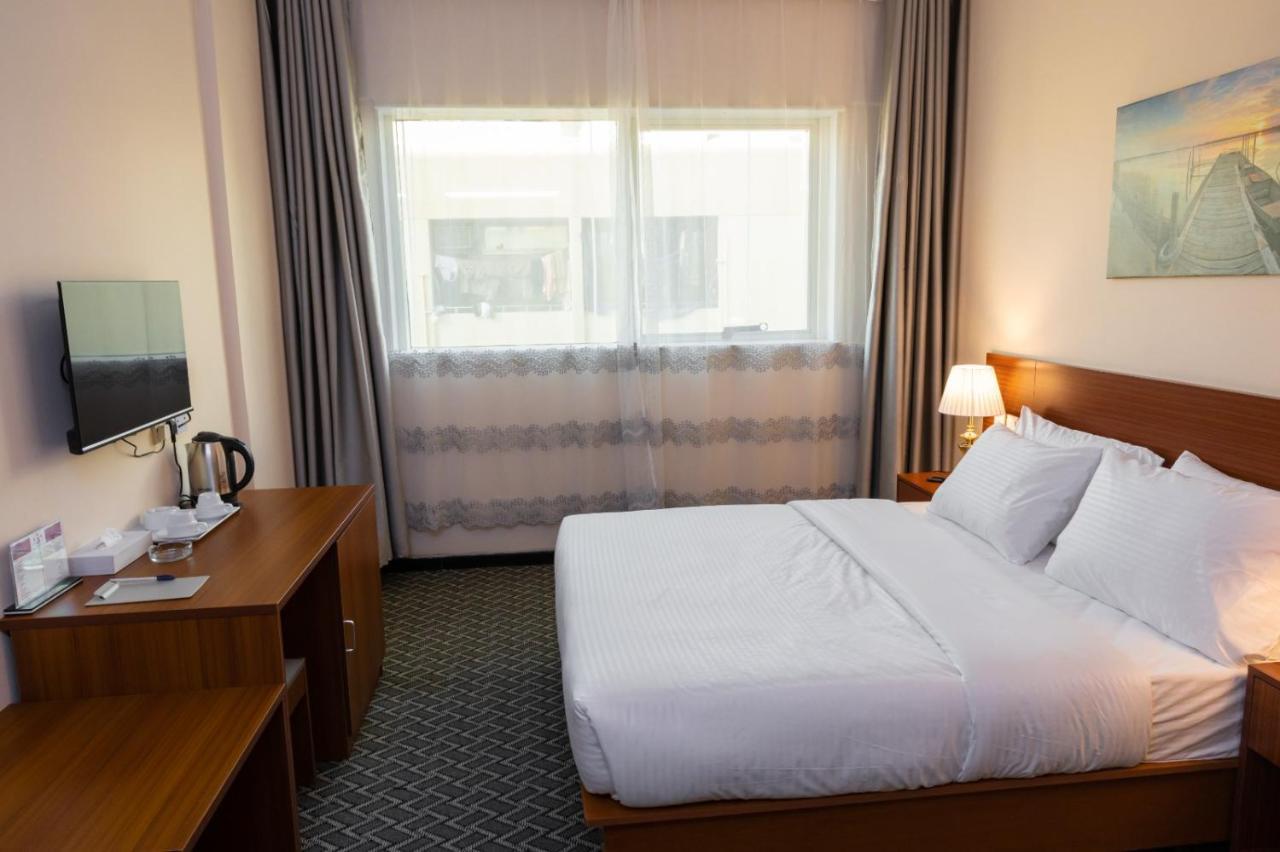 דובאי Three 888 Hotel מראה חיצוני תמונה
